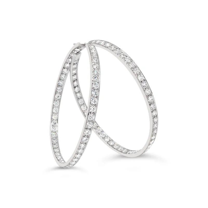 14KT WHITE GOLD DIAMOND HOOP EARRINGS.