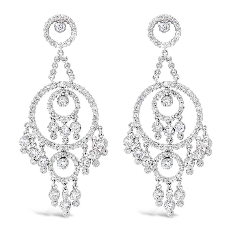 18KT WHITE GOLD DIAMOND DANGLE EARRINGS.