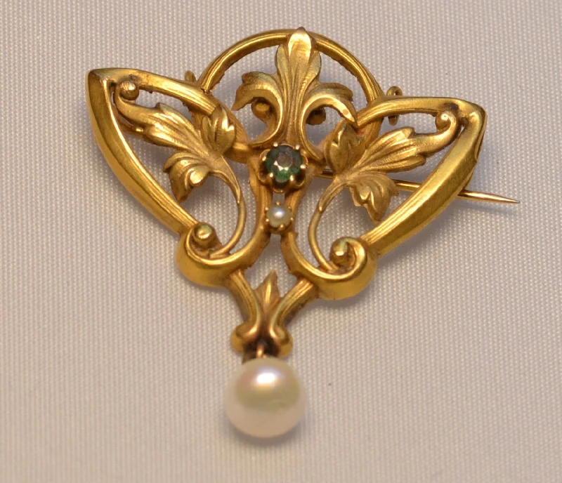 14K yellow gold Art Nouveau Brooch with one center Emerald and one pearl drop